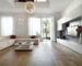 Modern living room with wood floor overlooking the garden